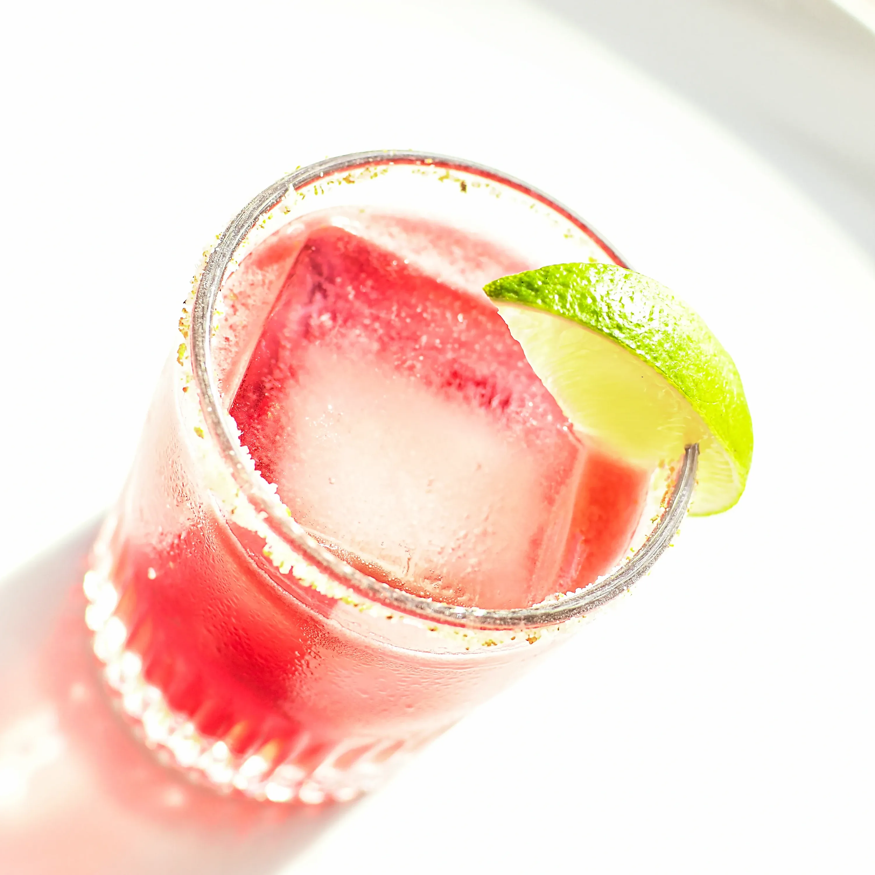 Hibiscus Margarita served over ice with lime